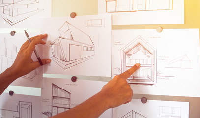 Architect Designer Engineer sketching drawing draft working Perspective Sketch  design house construction Project