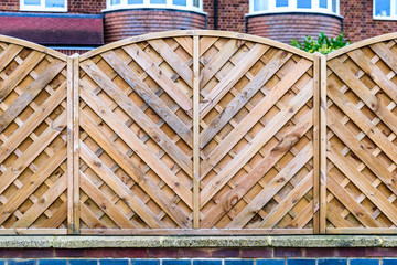 wooden boarded fence background in english town uk