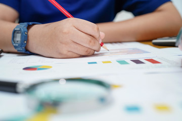 Children or kid calculate mathematics with pencil about math with graph : education study learning school concept