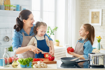 Happy family in the kitchen.