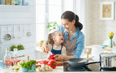 Happy family in the kitchen.