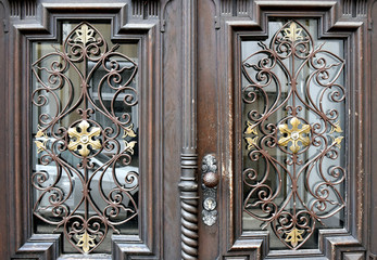 The doors are old wooden.Fragment of the door decoration.Knocker door.Herford Germany.