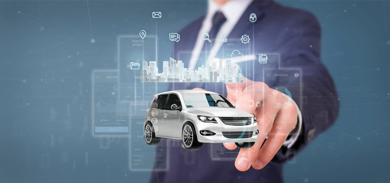 Businessman holding Dashboard smartcar interface with multimedia icon and city map on a background 3d rendering