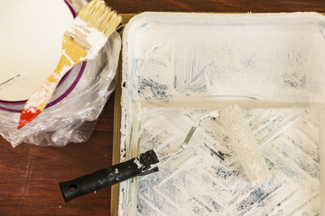 Fototapeta na wymiar White paint with essentials equipment