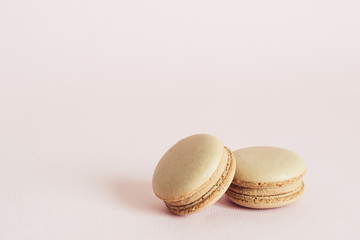 French macaroons cookies with coffee flavors. Holidays food concept with copy space