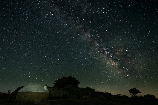 Night landscape with Milky Way in the Natural Park of Barruecos. Extremadura. Spain.