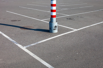 Metal pole on the parking lot