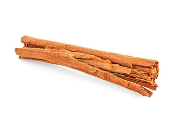Cinnamon stick isolated on white background, closeup. Ceylon cinnamon.