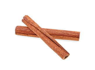 Two cinnamon sticks isolated on a white background. Full depth of field.