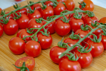 tomatoes on a wooden board