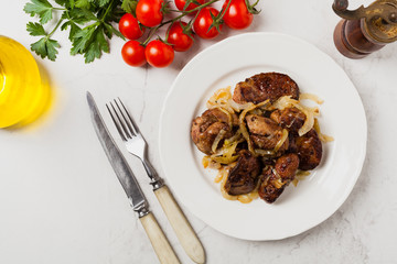 Fried chicken liver with onions.