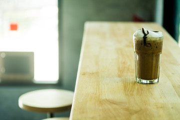 Iced coffee mocha with milk foam