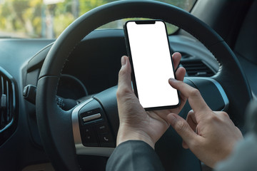 woman searching destination direction or address on gps or navigator application via mobile smartphone inside a car while driving car, close up