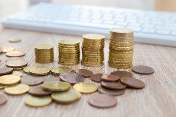 coins or currencies stacked, savings and economy