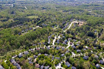 upper middle class american neighborhood with curving street in Maryland