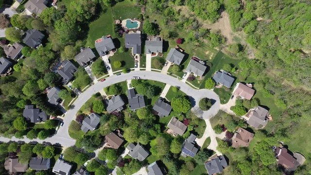 upper middle class american neighborhood with curving street in Maryland