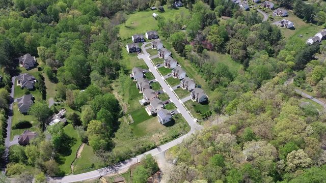 upper middle class american neighborhood with curving street in Maryland