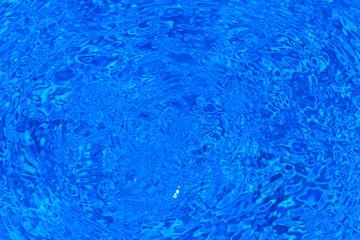 Blue ripped water in swimming pool