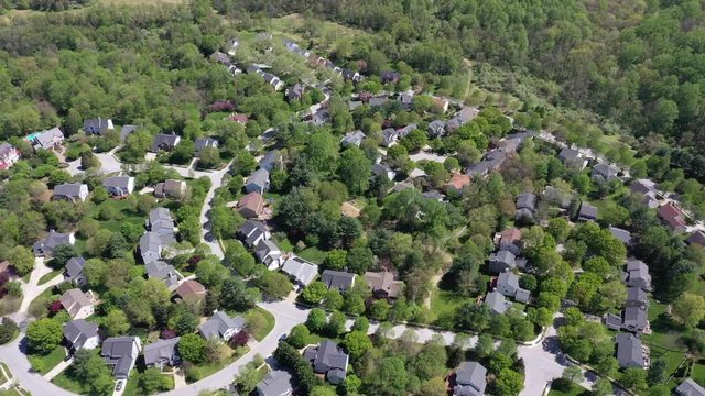 upper middle class american neighborhood with curving street in Maryland