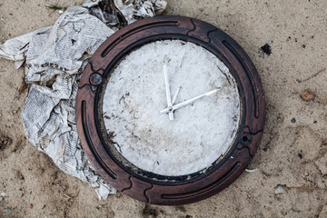 Broken clock without numerals on the clock face
