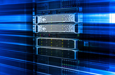 Server rack with working mainframe disk storage under motion blue effect