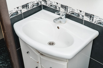 The photo of a sink in a bathroom