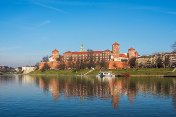 Obraz premium Wawel castle on bank of Vistula river in Krakow