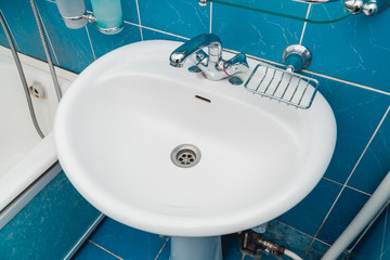 The photo of a sink in a bathroom