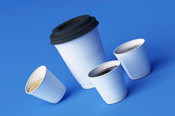 Set of white coffee cups on blue background. 3d rendering