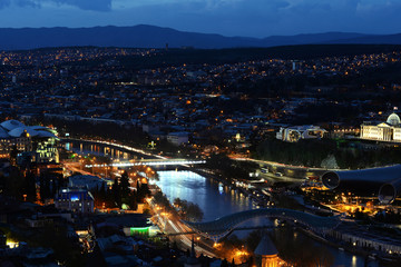 Fototapeta na wymiar Tbilisi, Georgia. Night city landscape. Old city from above