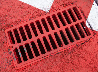 Drain grate on the road