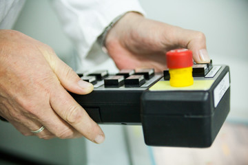 Pushing the button on the control panel