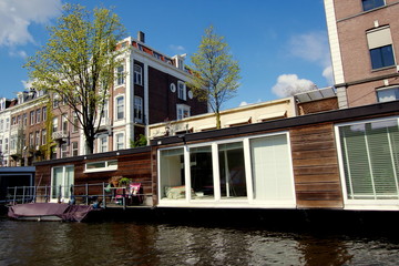 Traveling by ship through Amsterdam canals