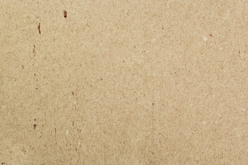 Fototapeta na wymiar Recycled craft paper texture. Brown cardboard sheet paper background.