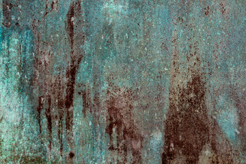 Ancient wall texture with patina or copper oxide stains. Grunge rusty background. Antique surface...