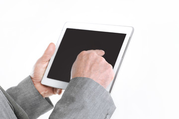 close up.businessman pointing finger at the digital tablet screen.isolated on white background