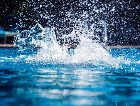 Abstract splash of water on a swimming pool