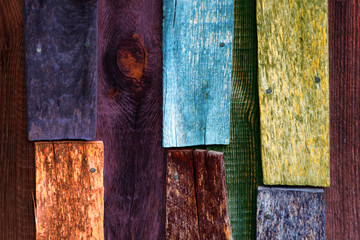 Weathered multicolored wooden boards background