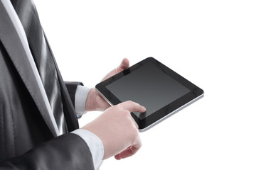 close up.businessman tapping the screen of the digital tablet