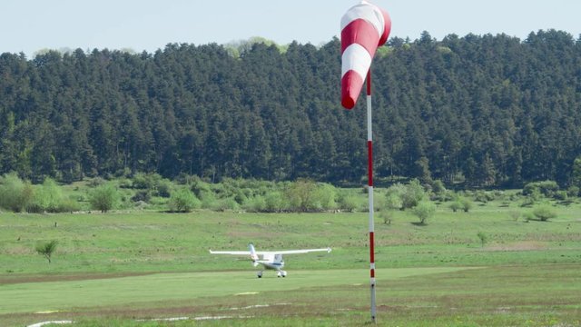 Small private plane jet taking off in civil aidrome