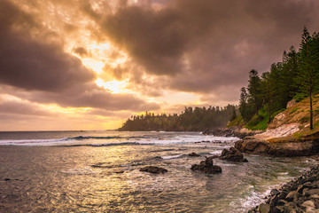 Fototapeta premium Golden Sunset over the ocean at Kingston, Norfolk Island