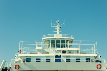  Large car-ferry docked in seaport. Big ship in a sea harbor. Concept- vacation, travel, transport.