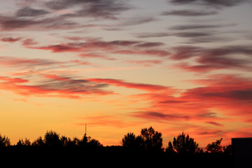 Fototapeta na wymiar Beautiful vivid color sunset clouds after sunset