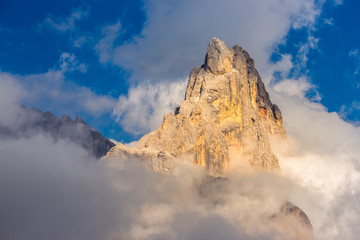 Fototapeta na wymiar Dolomite mountain peak in Passo di Rolle, Italy.