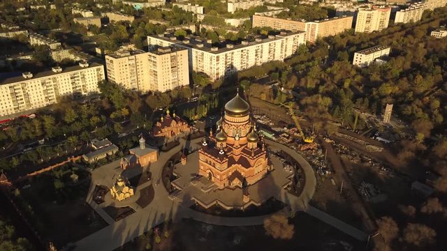 Aerial curch in the city sunset sunlight
