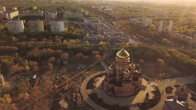 Aerial curch in the city sunset sunlight