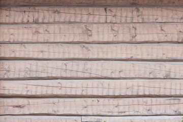 Peeled log wall exterior background