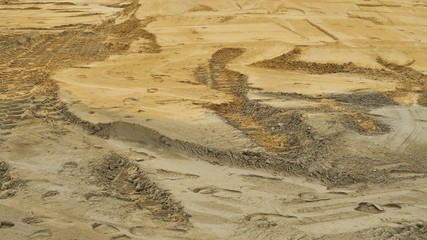Sand on a construction site as a background.