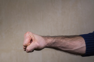 Man fist clenched in anger. Violence and aggression concept.