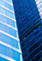 Fototapeta na wymiar Glass skyscrapers facades in business district